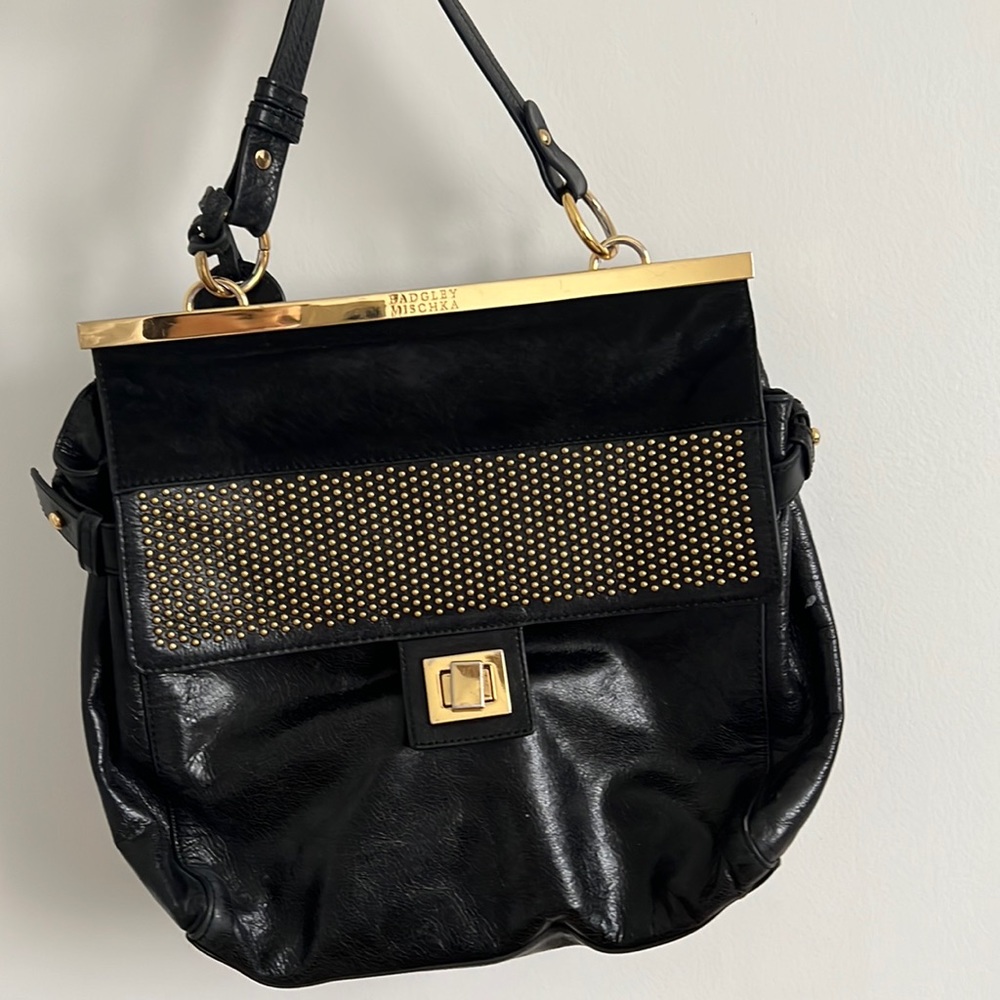 Badgley Mischka designer black handbag with additional long strap.